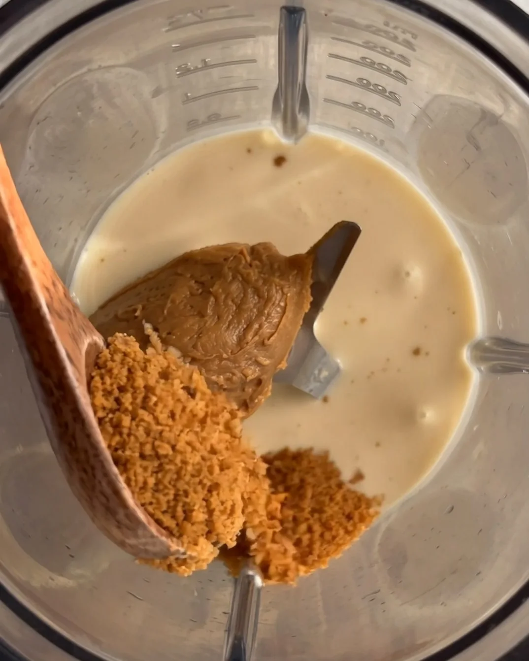 Biscoff spread, oat cream and brown cane sugar in a blender jug for the Biscoff cream of an ube latte