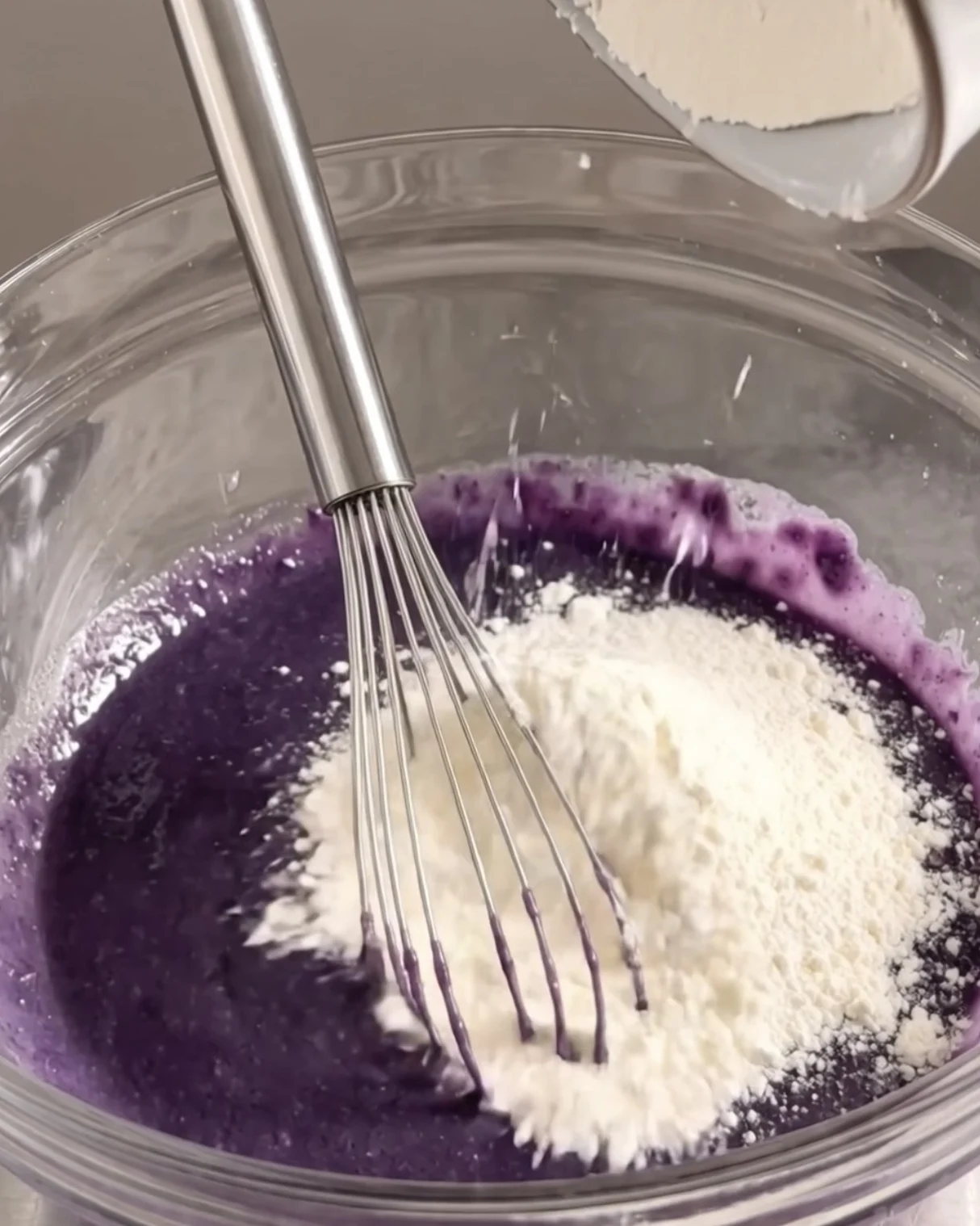 Adding flour and ube powder to the purple donut batter | Ube Nolia