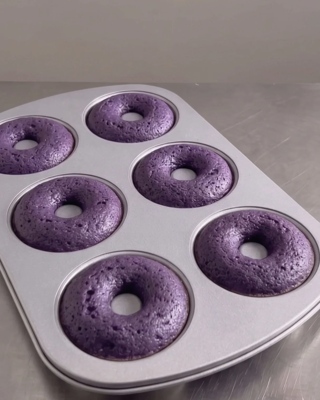 Freshly baked purple ube donuts in the pan | Ube Nolia